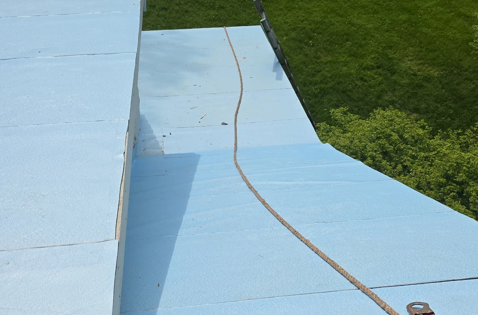 Ice and water shield installed across a roof deck during a roof replacement