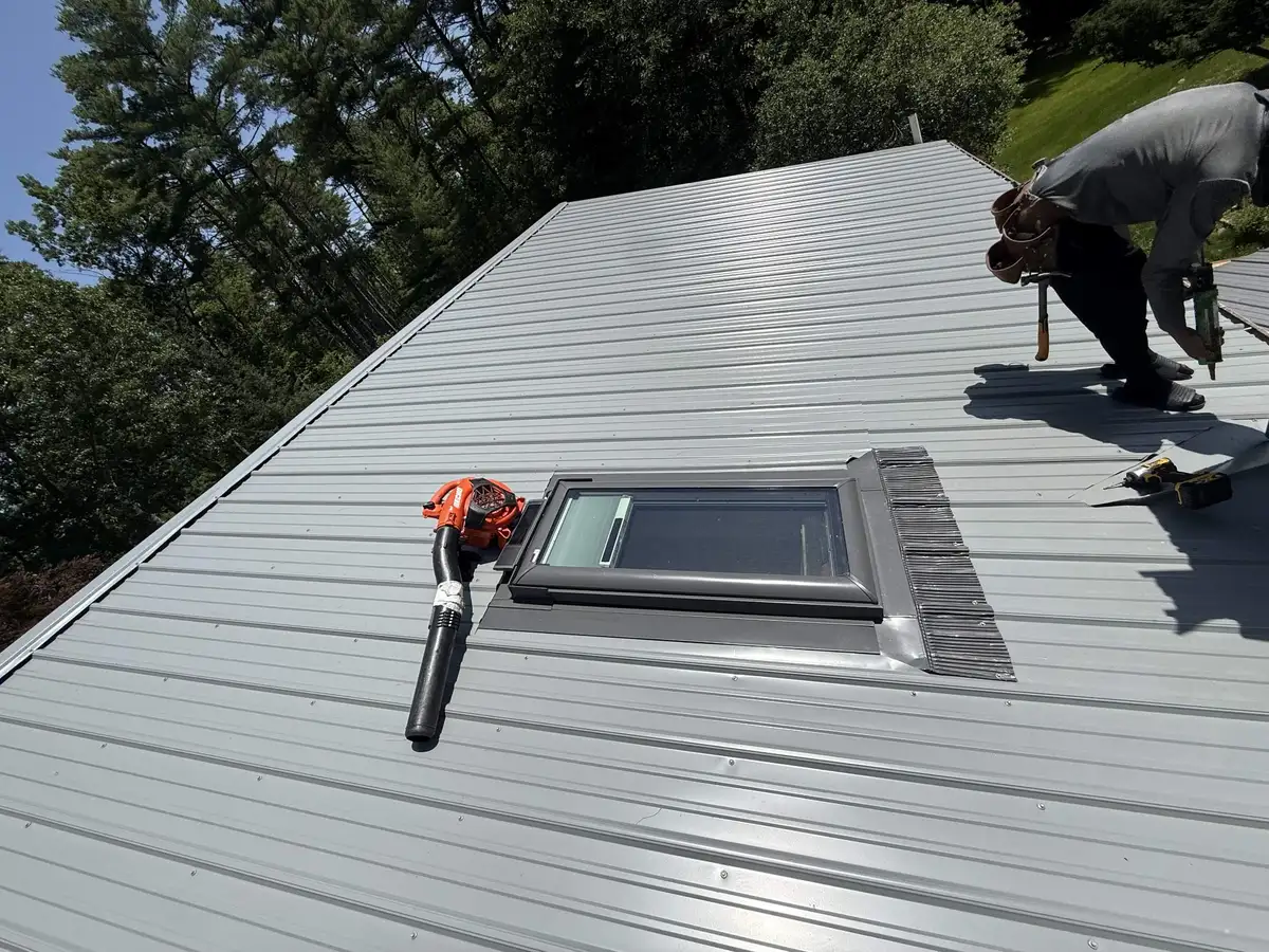 Skylight flashed into a new metal roof